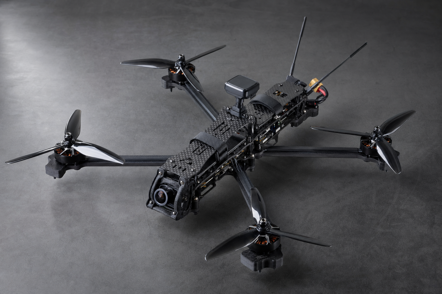 Modular FPV strike quadcopter, 10-inch class carbon-fiber airframe